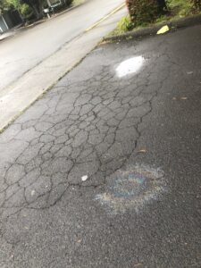 Cracks developing in asphalt
